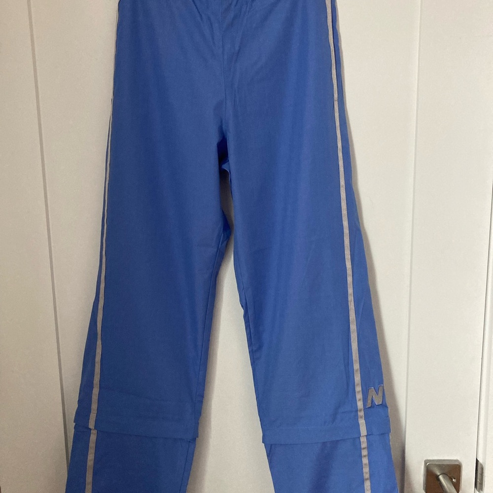 Women’s New Balance Blue Athletic Pants with Reflective Stripes